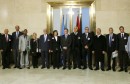 Special Representative of Secretary-General for Libya and Head of UNSMIL Leon poses with delegates for a group photograph after a news conference in Geneva
