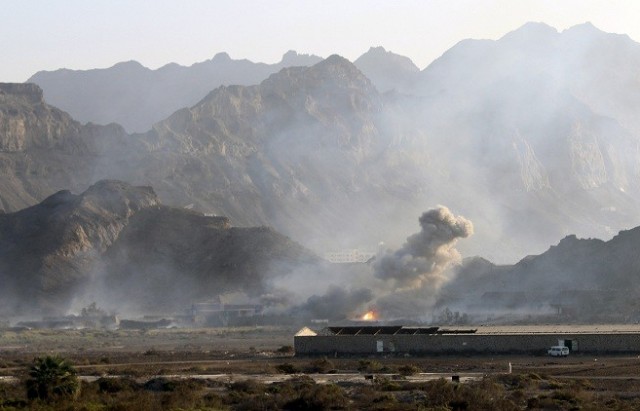 Smoke rises from an arms depot at the Jabal Hadeed military compound in Aden