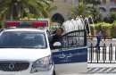 2A0600DC00000578-3140454-Guard_A_Tunisian_police_car_patrols_in_front_of_the_Riu_Imperial-a-54_1435403163680
