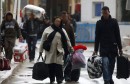 Tunisians arrive in Tunisia after fleeing unrest in Libya