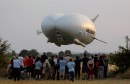 The Airlander 10 hybrid airship makes its maiden flight at Cardington Airfield in Britain