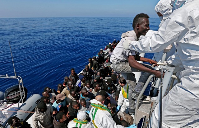 220 migrants rescued by an Italian ship in the Mediterranean sea