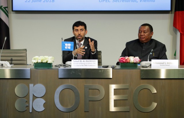 UAE's Oil Minister OPEC President Mohamed Al Mazrouei and OPEC Secretary General Barkindo address a news conference after an OPEC meeting in Vienna