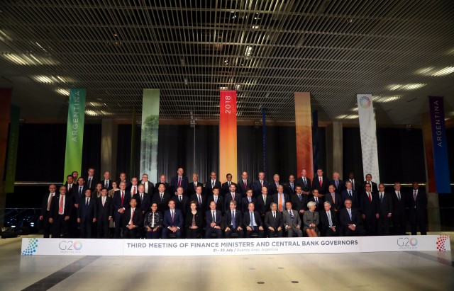 Finance ministers and Central Bank presidents pose for the official photo at the G20 Meeting of Finance Ministers in Buenos Aires
