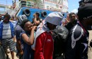 Migrants arrive at a the southern port of Zarzis