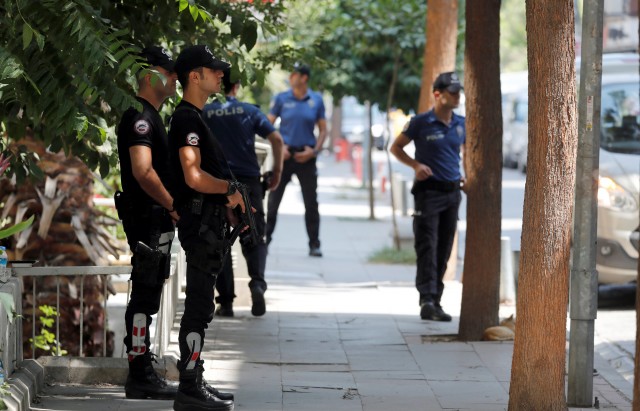 Police officers patrol outside the home of U.S. pastor Andrew Brunson in Izmir