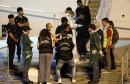 Unaccompanied minor migrants disembark from the Italian coast guard vessel "Diciotti" at the port of Catania