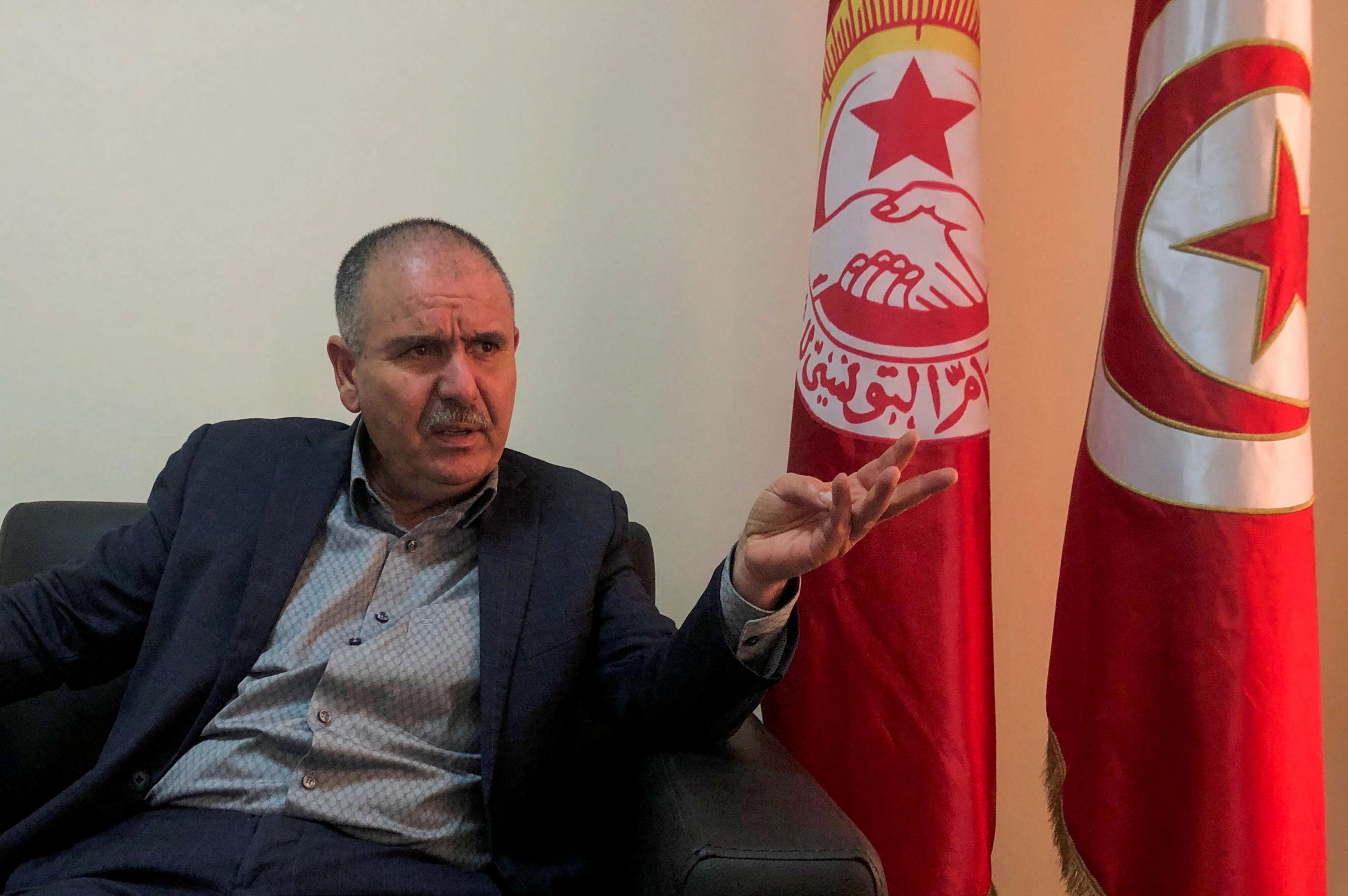 FILE PHOTO: Noureddine Taboubi, Secretary General of the Tunisian General Labour Union (UGTT), speaks during an interview with Reuters in Tunis