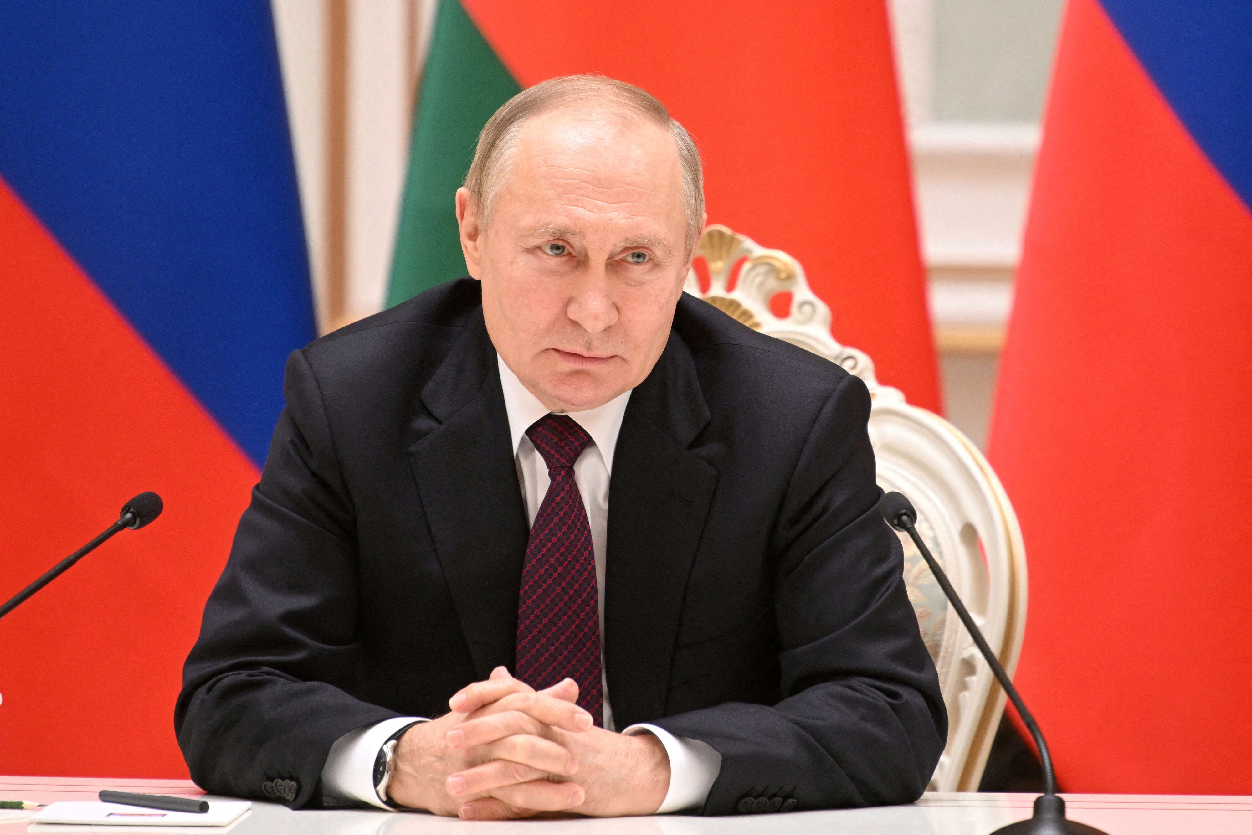 FILE PHOTO: Russian President Vladimir Putin attends a news conference in Minsk