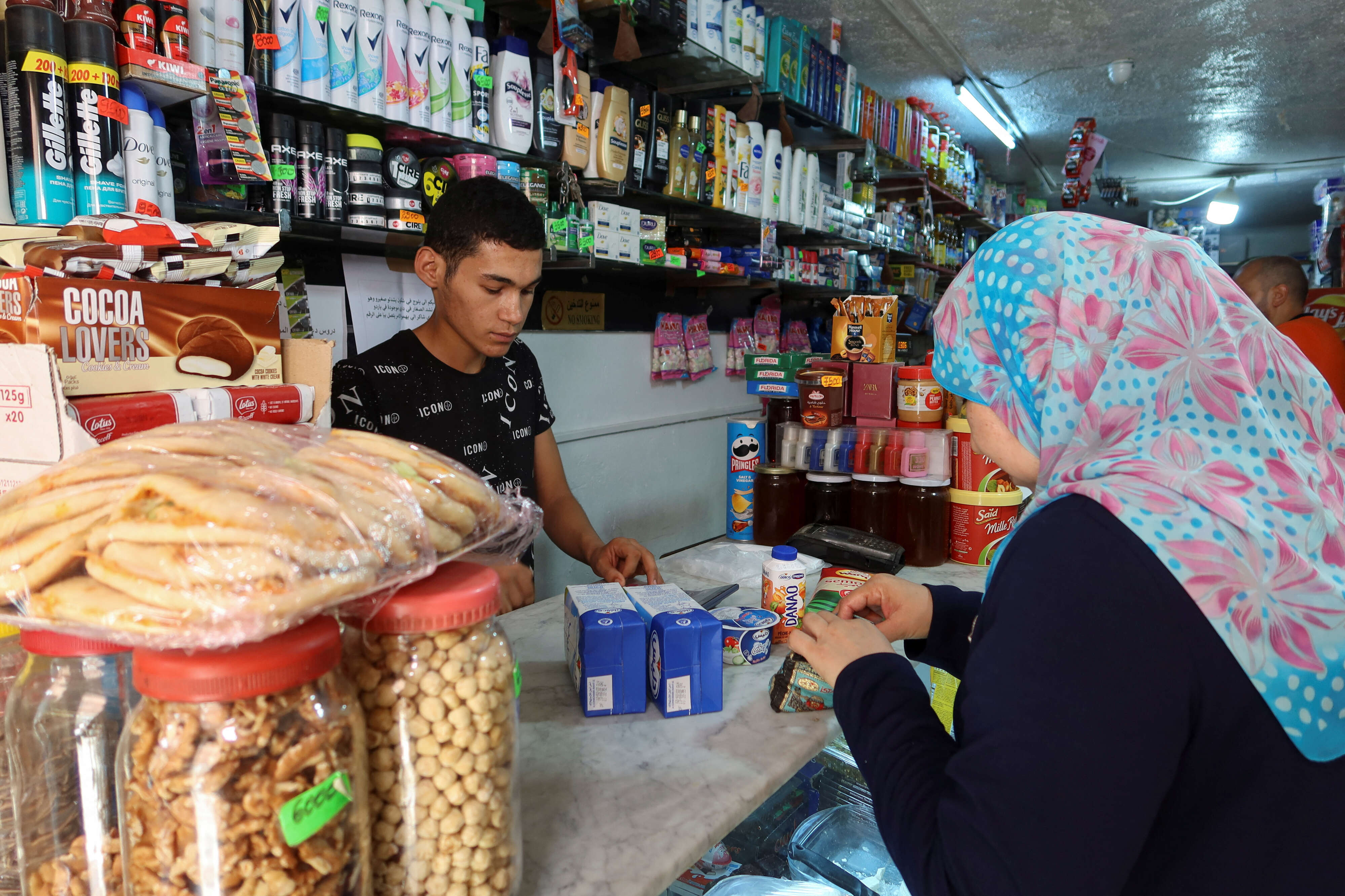 A woman shops at a grocery store in Tunis